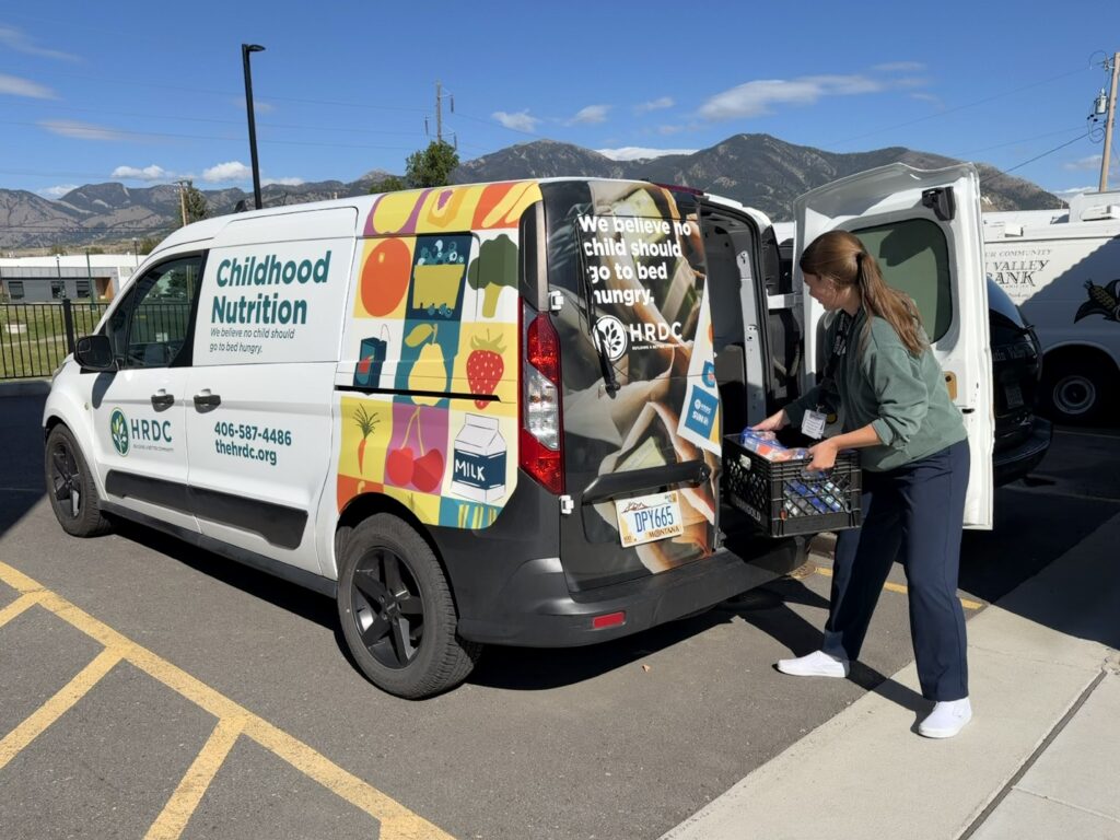 Loading Childhood Nutrition van with KidsPacks,